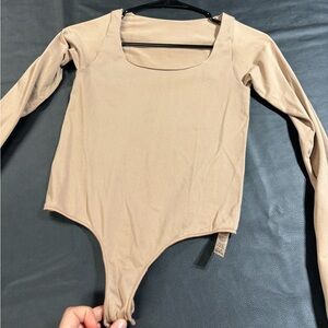 Skims long sleeve seamless bodysuit